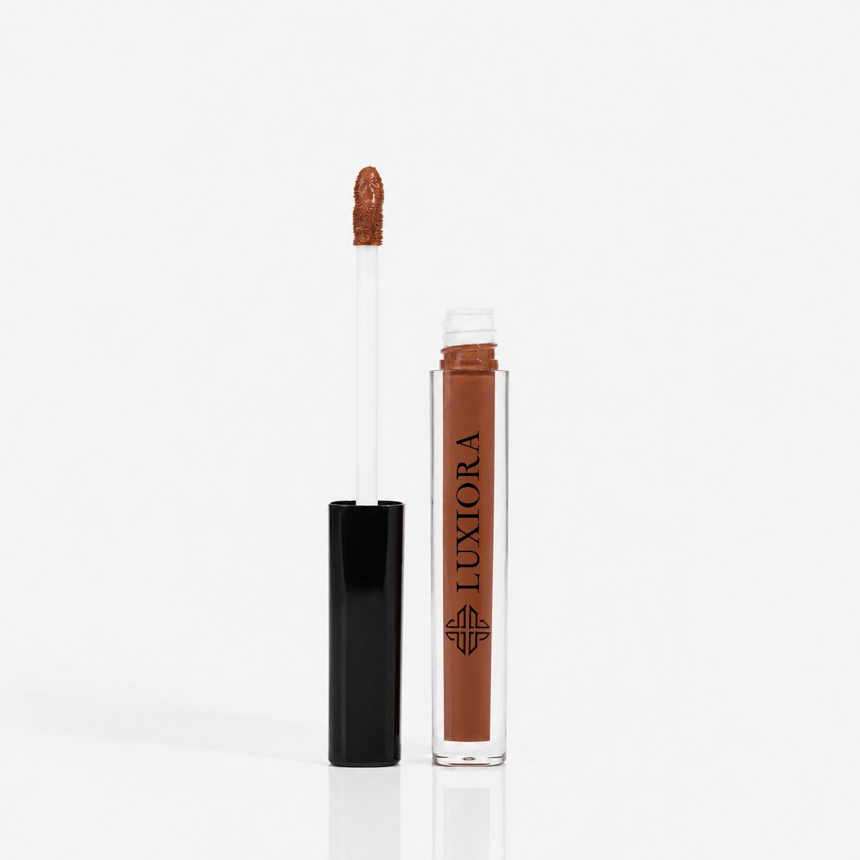 Chai Date caramel brown nude velvet matte liquid lipstick tube, SPF 15+ brown nude lipstick — solid and trending (the 90s brown-nude comeback)